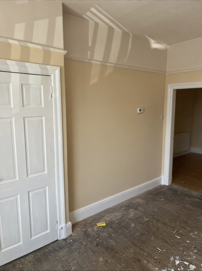 Walls freshly skimmed during a room renovation in a Burnley terrace